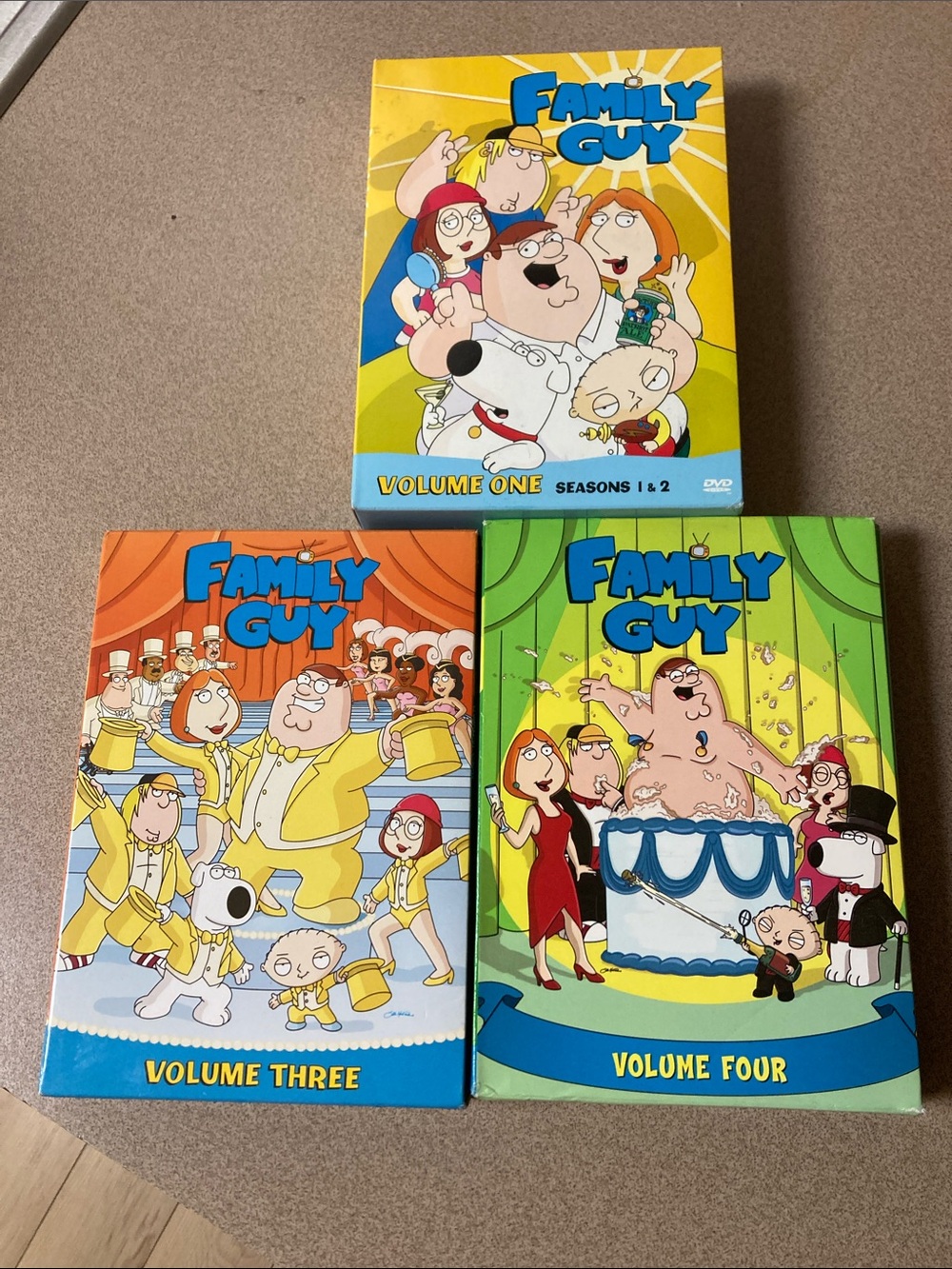 Family guy dvd Box Set Volumes 1-4 - Yellow/Blue/Green Cover Artwork